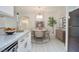 Dining room showcases pendant lighting, a round table with seating, and modern decor at 1830 N Buffalo Dr # 1091, Las Vegas, NV 89128
