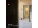Inviting entryway showing a glimpse of the home's interior, creating a warm and welcoming first impression at 1830 N Buffalo Dr # 1091, Las Vegas, NV 89128