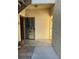 Welcoming entrance with a secure gate and a spacious porch, offering both safety and curb appeal at 1830 N Buffalo Dr # 1091, Las Vegas, NV 89128