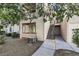 Exterior view of a well-maintained home with a tidy yard and convenient access to the entrance at 1830 N Buffalo Dr # 1091, Las Vegas, NV 89128