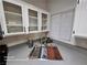 Kitchen sink with stainless steel fixtures, gray countertops, and ample natural light at 1830 N Buffalo Dr # 1091, Las Vegas, NV 89128