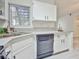 Kitchen sink area with plenty of counterspace, stainless steel appliances, and natural lighting at 1830 N Buffalo Dr # 1091, Las Vegas, NV 89128