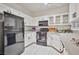 Kitchen showcases white cabinets, modern countertops, and sleek appliances for a contemporary feel at 1830 N Buffalo Dr # 1091, Las Vegas, NV 89128