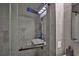 Modern tiled shower with rain head and body jets at 1830 N Buffalo Dr # 1091, Las Vegas, NV 89128