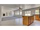Bright open living room with fireplace, open floorplan and kitchen island at 1890 Bova Matrina Ct, Las Vegas, NV 89123