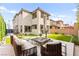 A spacious backyard featuring patio seating and manicured landscaping for outdoor entertainment at 2407 Ridgeline Wash St, Las Vegas, NV 89138