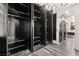Walk-in closet with open shelving and drawers, showcasing storage solutions and modern design at 2407 Ridgeline Wash St, Las Vegas, NV 89138