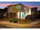 Inviting two-story home with a well-manicured lawn and a two car garage at 2407 Ridgeline Wash St, Las Vegas, NV 89138