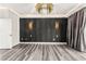 Contemporary living room boasts modern lighting, elegant wallpaper, and sleek floors at 2407 Ridgeline Wash St, Las Vegas, NV 89138