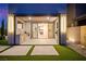 Inviting outdoor living space with a covered patio, built-in kitchen, and seamless transition to the indoors at 2407 Ridgeline Wash St, Las Vegas, NV 89138