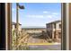 View from a window of the neighborhood showcasing the architecture and landscape at 2407 Ridgeline Wash St, Las Vegas, NV 89138