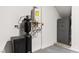 Interior view of a tankless water heater, water softener and a safe at 2407 Ridgeline Wash St, Las Vegas, NV 89138
