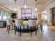 Stylish bar area features unique lighting, comfortable seating, and a well-stocked display at 28 Painted Feather Way, Las Vegas, NV 89135