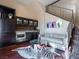 Stylish living area with modern wet bar, comfortable seating, and unique decor at 28 Painted Feather Way, Las Vegas, NV 89135