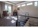 Well-lit loft area with office space, modern decor, and a view of the staircase at 28 Painted Feather Way, Las Vegas, NV 89135