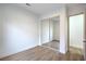 Bedroom featuring laminate floors and a sliding closet door at 3020 Via Venezia, Henderson, NV 89052
