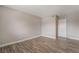Spacious bedroom featuring sleek, modern wood-look flooring at 3151 Soaring Gulls Dr # 2034, Las Vegas, NV 89128