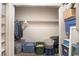 Spacious walk-in closet with clothing rack, shelving, and plenty of storage bins at 3151 Soaring Gulls Dr # 2034, Las Vegas, NV 89128