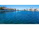Picturesque waterfront view of the canal, showcasing calm blue waters and lovely neighborhood homes at 3151 Soaring Gulls Dr # 2034, Las Vegas, NV 89128