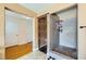 Modern bathroom with an enclosed glass shower featuring updated fixtures at 3381 Biscayne Bay Dr, Las Vegas, NV 89117