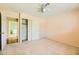 Bedroom featuring carpeted floor, a ceiling fan and closet at 3381 Biscayne Bay Dr, Las Vegas, NV 89117