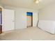 Carpeted bedroom featuring a ceiling fan and closet with sliding doors at 3381 Biscayne Bay Dr, Las Vegas, NV 89117
