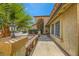 Palm tree and well-maintained walkway add curb appeal to this lovely home at 3381 Biscayne Bay Dr, Las Vegas, NV 89117