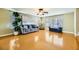 Bright living room with hardwood floors, a comfortable sofa, and plenty of natural light at 3381 Biscayne Bay Dr, Las Vegas, NV 89117