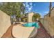 Backyard swimming pool with spa and patio area at 3381 Biscayne Bay Dr, Las Vegas, NV 89117