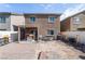 View of backyard with covered patio and partially finished landscaping at 3553 Judson Ave, Las Vegas, NV 89115