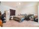 Bedroom with carpet flooring, standard closet, and functional workspace at 3553 Judson Ave, Las Vegas, NV 89115