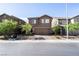 Charming two-story home featuring a two-car garage, well-kept landscaping, and a welcoming brick-paved driveway at 3553 Judson Ave, Las Vegas, NV 89115