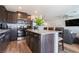 Modern kitchen seamlessly connects to the living room, offering an inviting space to connect at 3553 Judson Ave, Las Vegas, NV 89115