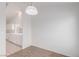 Cozy dining nook features a pendant light and views of the kitchen at 3606 Altar Rock Ln, North Las Vegas, NV 89032