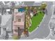 A bird's-eye view of the property showcasing a backyard pool and lush landscaping at 4169 San Capri Way, Las Vegas, NV 89141
