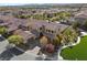 Expansive aerial view of the home's manicured lawn, mature trees, and cul-de-sac street at 4169 San Capri Way, Las Vegas, NV 89141