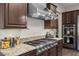 Well-equipped kitchen featuring granite countertops and a high-end stainless steel stove and range at 4169 San Capri Way, Las Vegas, NV 89141