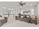 Comfortable loft area with neutral paint, carpet, ceiling fan, and backyard views at 4169 San Capri Way, Las Vegas, NV 89141
