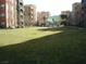 Well-maintained common green area with seating, offering a relaxing outdoor space at 50 E Serene Ave # 321, Las Vegas, NV 89123
