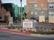 Close-up of Manhattan Condominiums community signage with building details and access point at 50 E Serene Ave # 321, Las Vegas, NV 89123