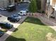 Overhead view of a lush courtyard, with well-maintained lawn, trees, walkways and convenient parking at 50 E Serene Ave # 321, Las Vegas, NV 89123