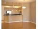Kitchen with granite countertops, stainless steel appliances, and hardwood floors at 50 E Serene Ave # 321, Las Vegas, NV 89123