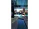 Unique community pool with varying depths and glass accents, providing a modern and luxurious experience at 50 E Serene Ave # 321, Las Vegas, NV 89123