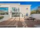Spacious backyard with gravel landscaping and modern patio furniture at 5077 Thunder River Cir, Las Vegas, NV 89148
