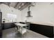 Modern kitchen featuring sleek cabinets, stainless steel appliances, butcher block counters, and an industrial-style ceiling at 5077 Thunder River Cir, Las Vegas, NV 89148