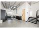 Contemporary kitchen with modern appliances, sleek cabinetry, and an open layout with an industrial-style ceiling at 5077 Thunder River Cir, Las Vegas, NV 89148