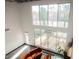 Bright living room with floor-to-ceiling windows and modern furnishings overlooks a charming courtyard at 5077 Thunder River Cir, Las Vegas, NV 89148