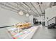 Open-concept space featuring exposed ductwork and modern furnishings at 5077 Thunder River Cir, Las Vegas, NV 89148