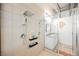 Luxurious shower featuring dual shower heads, built-in shelving, and a sleek glass enclosure at 5077 Thunder River Cir, Las Vegas, NV 89148