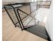 Interior staircase with metal railings leading down to the main floor of the home at 5077 Thunder River Cir, Las Vegas, NV 89148